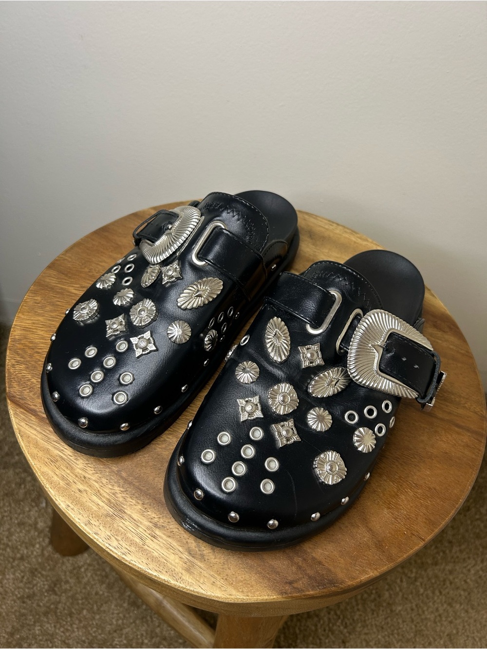Black Studded Slip-On Clogs with Silver Buckle and Accents